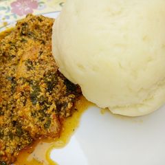 A picture of Pounded yam with Melon soup.
