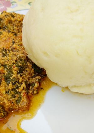 A picture of Pounded yam with Melon soup.