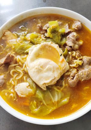 A picture of Instant Noodle with Pork and Egg.