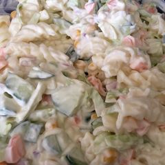 A picture of White pasta with salad n mayonnaise.