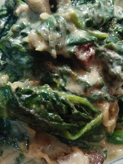 Una foto de Espinacas en salsa de queso azul