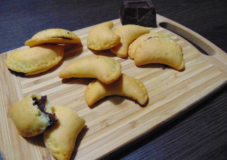 Mezzelune di ricotta e arancia con cioccolato e mascarpone