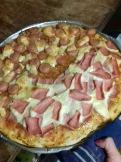 Una foto de Pizza casera 💚