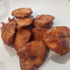 A picture of Crispy Honey Glazed Plaintain/Banana Fritters.