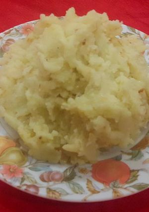 Una foto de Puré con cebolla dorada