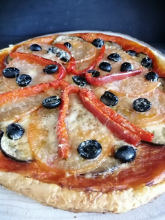 Una foto de Pizza vegetariana