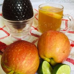 A picture of Apple tea with Apple peels.