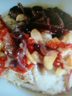 Una foto de Lomo de bacalao con cebolla confitada