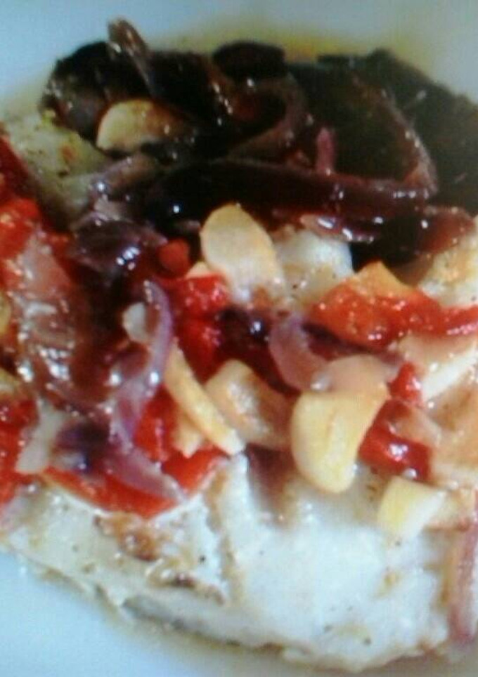 Una foto de Lomo de bacalao con cebolla confitada