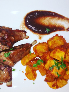 A picture of #week4recipechallenge.Viazi karai,pork chops, tamarind sauce.