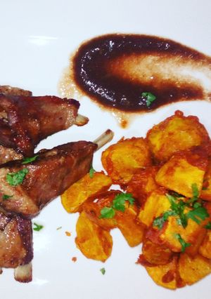 A picture of #week4recipechallenge.Viazi karai,pork chops, tamarind sauce.
