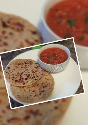 A picture of Sattu Paratha with Tomato chutney.