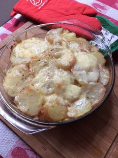 Una foto de Papas con nata