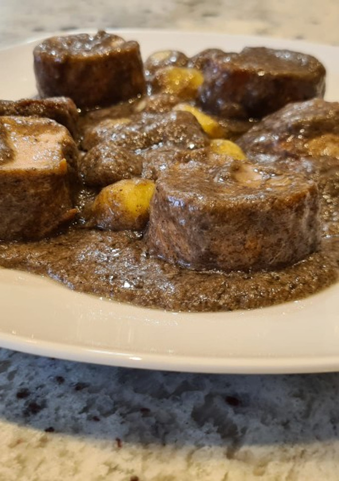 Una foto de Solomillo de cerdo champiñones y shiitake al cava
