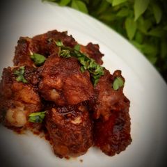 A picture of Sweet, sour and spicy chicken wings.