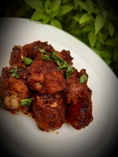 A picture of Sweet, sour and spicy chicken wings.