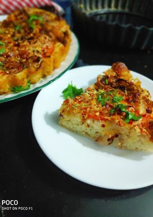 A picture of Quick Foccasia with Caramelised onion and tomato.