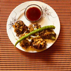A picture of Veg pakoda oil free vegetarian dish 0 oil onion potatoes cabbage,healthy pakoda for diet,snacks.