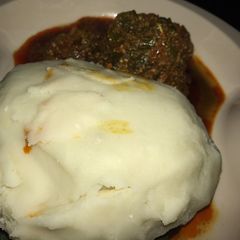 A picture of Pounded yam and egusi soup.