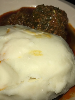 A picture of Pounded yam and egusi soup.