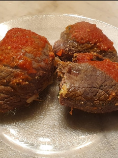 Una foto de Niño envuelto de carne