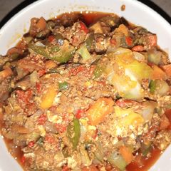 A picture of Egg and veggies sauce.
