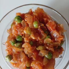 A picture of Baingan Bharta with Peas.