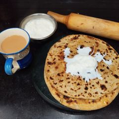 A picture of Rajgira Flour Paneer Paratha with Fresh Malai.