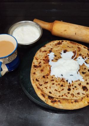 A picture of Rajgira Flour Paneer Paratha with Fresh Malai.