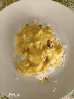 Una foto de Arroz con pollo al curry
