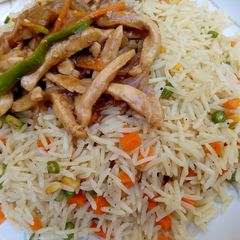Coconut fried rice with shredded chicken sauce A picture of Coconut fried rice with shredded chicken sauce.