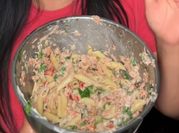 A picture of penne pasta salad