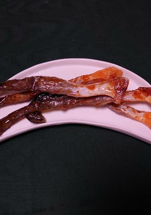 A picture of Leftover salmon skin crisps.