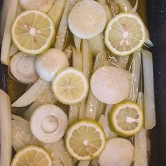 A picture of Oven-Baked Potatoes with Garlic and Lemon.