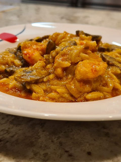 Una foto de Risotto de champiñones y gambas
