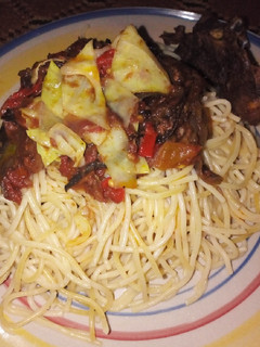 A picture of Pasta and delicious dried fish sauce.