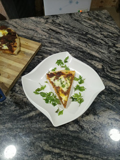 A picture of Sweet Mutton Pizza.