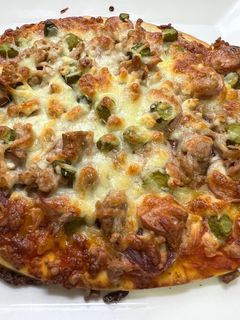 Una foto de Pizza “Hugo Especiale”