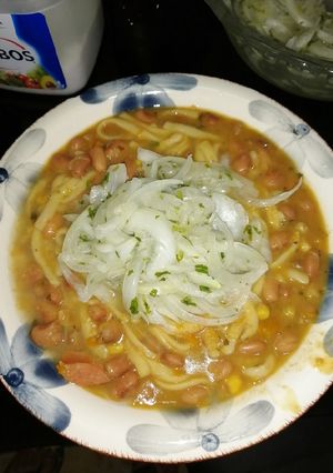 Una foto de Porotos con cebolla 🤤