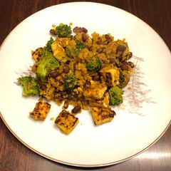 A picture of Cauliflower Yellow Rice with Black Bean,Tofu,and Broccoli 🥦.