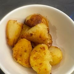 A picture of PERFECT - WORLDS BEST - Roast Potatos - no joke these are Amazing - Enjoy :P.