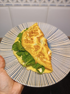 Una foto de Tortilla con espinacas y queso