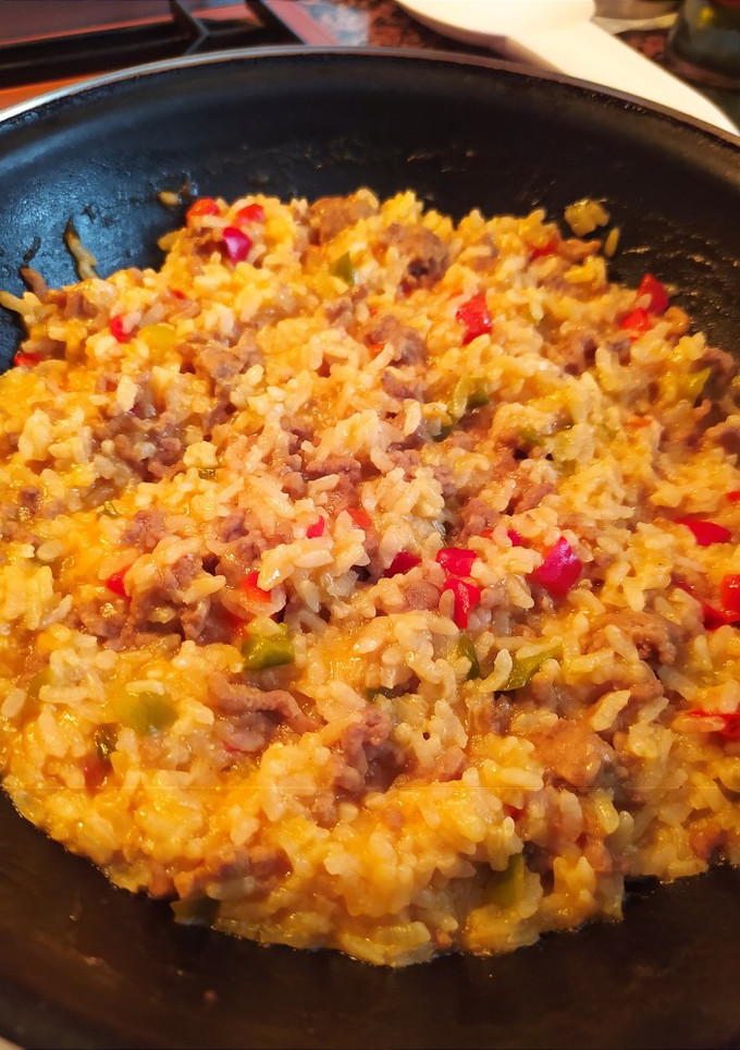 Una foto de Arroz meloso con carne picada y pimiento