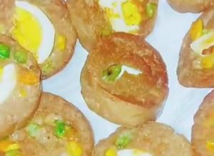 Una foto de Receta con molípollo huevo verduras