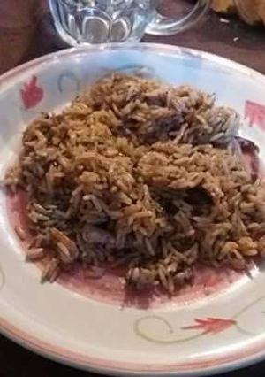 Una foto de Risotto con calamar 🐙😋