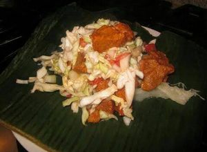 Una foto de Cerdo (chancho) con Yuca