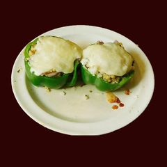 A picture of Bell pepper stuffed with dal rice.