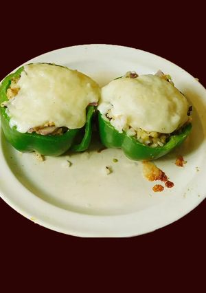 A picture of Bell pepper stuffed with dal rice.