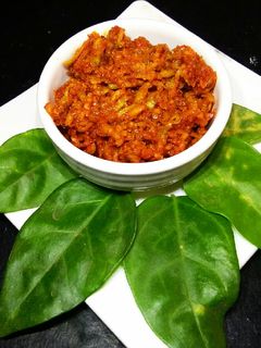 कैरीचा तक्कु(आंबटगोड) (kairicha takku recipe in marathi) रेसिपी चे मुख्य फोटो