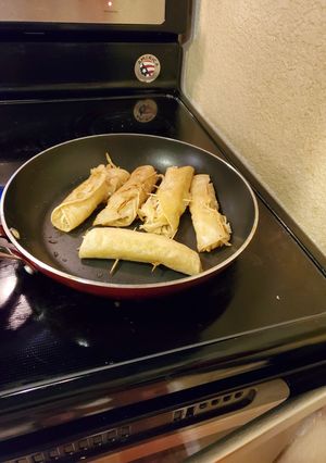 Una foto de Flautas de pollo